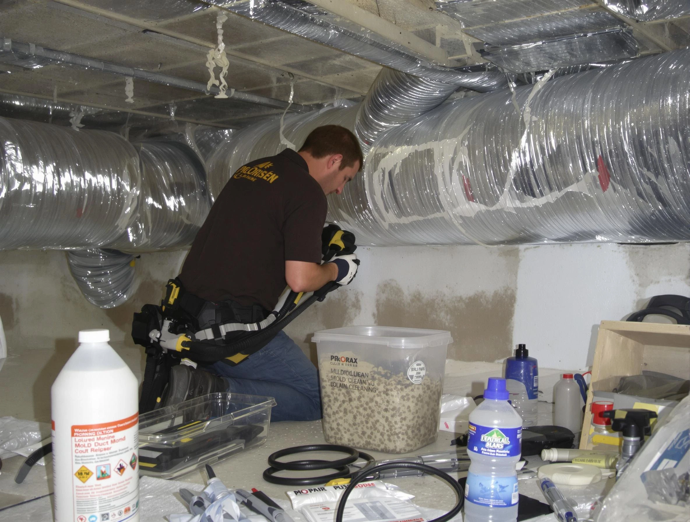 East Providence Air Duct Cleaning specialist performing professional mold removal from air ducts in East Providence